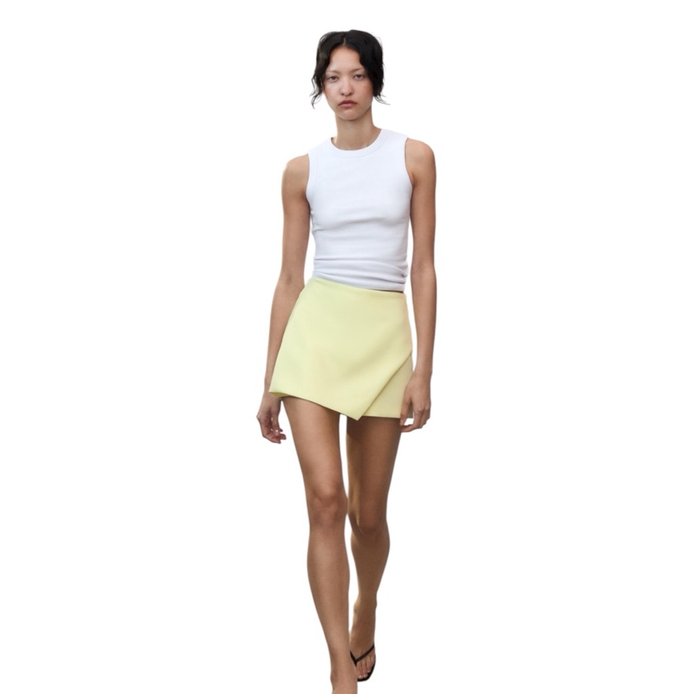 The Zara Trafaluc faux leather mini skirt in size Small